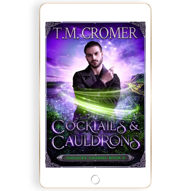 Ebook cover of 'Cocktails & Cauldrons' by T.M. Cromer on a tablet device.