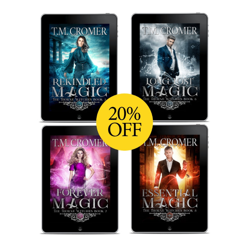 Four tablet screens displaying book covers by T.M. Croomer with a 20% off label.